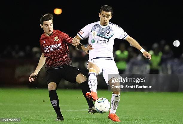 Kristian Trajceski of Hume City and Daniel Georgievski of Melbourne Victory compete for the ball during the FFA Cup Round of 16 match between Hume...