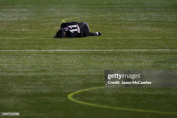 Danny Choi of Blacktown lies injured during the round 16 FFA Cup match between Blacktown City and Bonnyrigg White Eagles at Lilys Football Stadium on...