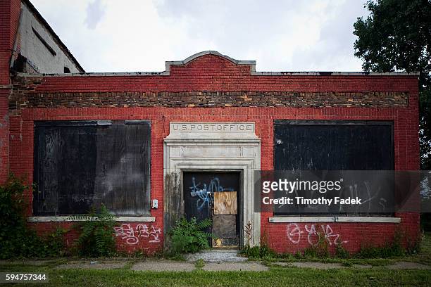 An abandoned US Post Office. The decades-long decline of the U.S. Automobile industry is acutely reflected in the urban decay of Detroit, the city...