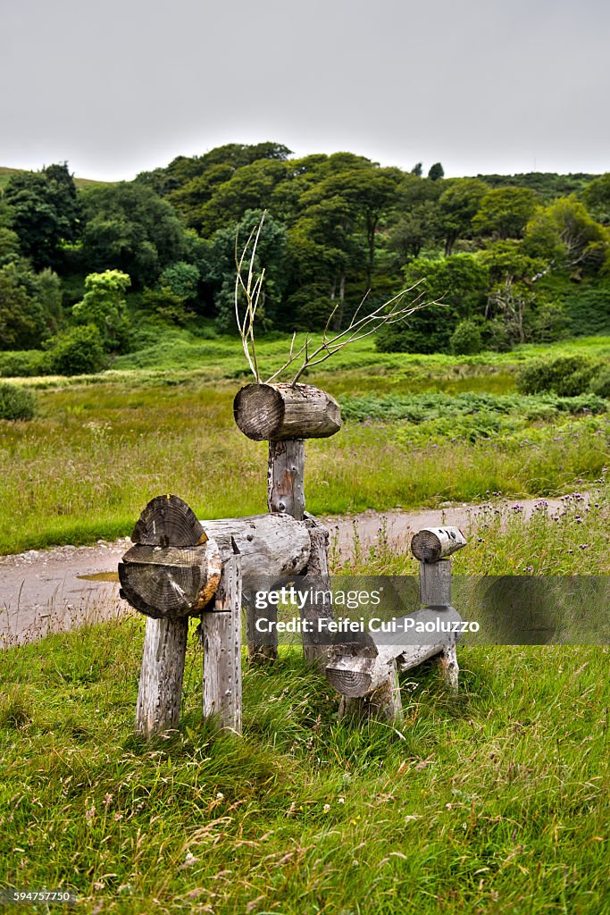 Wooden sculpture of Roe deer at Skipness bay of Isle of Arran in Scotland