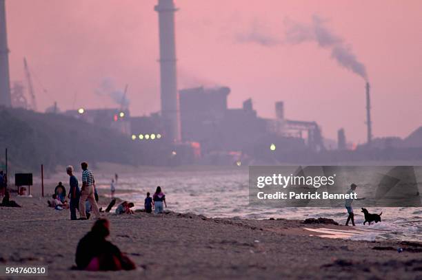 View of Gary Works steelmill from the beach in Dunes State Park. | Location: Dunes State Park, Indiana, USA.