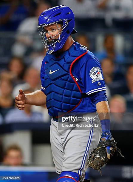 Josh Thole of the Toronto Blue Jays in action against the New York Yankees in a game at Yankee Stadium on August 15, 2016 in the Bronx borough of New...