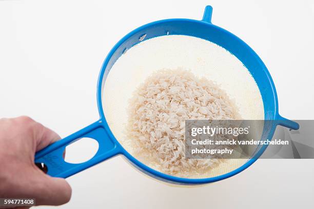 Using A Sieve For Rice 180 Sieving Rice Stock Photos, High-Res Pictures, and Images - Getty Images