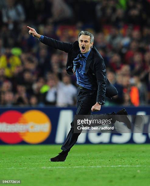 Inter Milan Coach Jose Mourinho celebrates victory in the UEFA Champions League Semi Final 2nd Leg match between Barcelona and Inter Milan at the Nou...