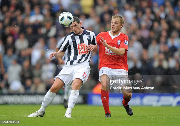 Graham Dorrans of West Bromwich Albion and Sebastian Larsson of Birmingham City