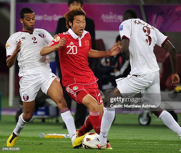 Hamid Ismail of Qatar and Rong Hao of China and Mohammed Kasola of Qatar