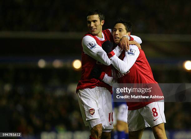 Samir Nasri of Arsenal celebrates after scoring a goal to make it 0-2 with Robin van Persie of Arsenal