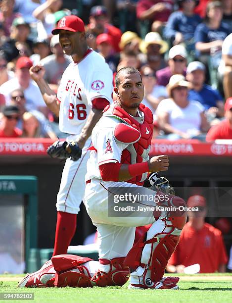 Ramirez of the Los Angeles Angels as Carlos Perez looks on after the final out of the eighth inning leaving bases loaded for the New York Yankees at...