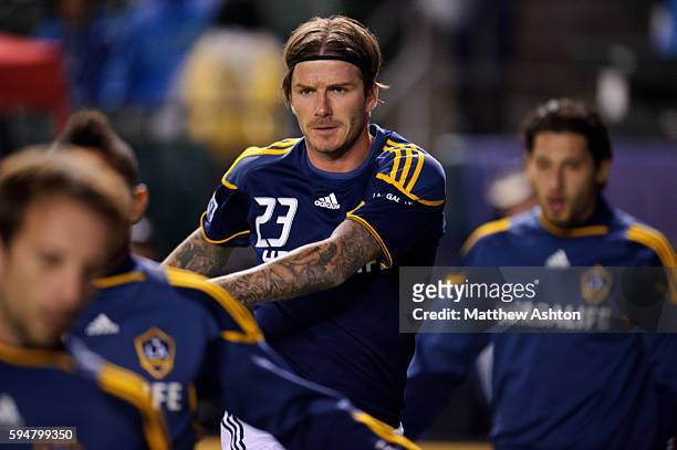 David Beckham of Los Angeles Galaxy warms up before the game