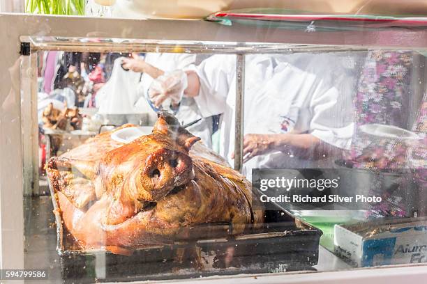 paloquemao market, whole pig roasted in bogota colombia - paloquemao stock pictures, royalty-free photos & images