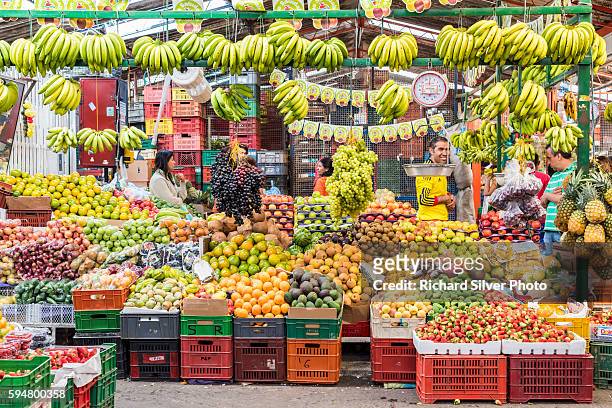 bananas and fruits at paloquemao market in bogota colombia - colombia stockfoto's en -beelden