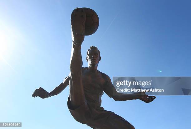 Dennis Bergkamp statue at the Emirates stadium, home of Arsenal