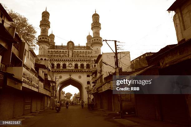 view of charminar from laad bazaar road - laad bazaar stock pictures, royalty-free photos & images