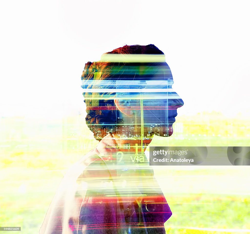 Multiple exposure of girl and traffic