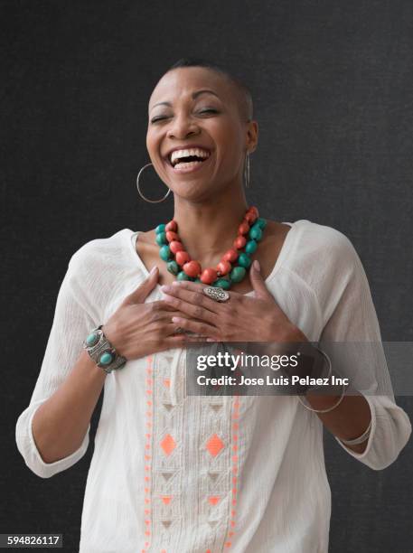 close up of black woman laughing - 2015 40 stock pictures, royalty-free photos & images