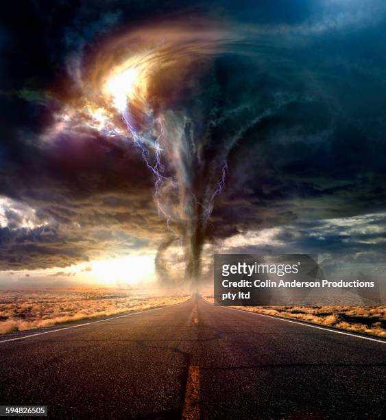 tornado on remote desert road - extreme weather stock pictures, royalty-free photos & images