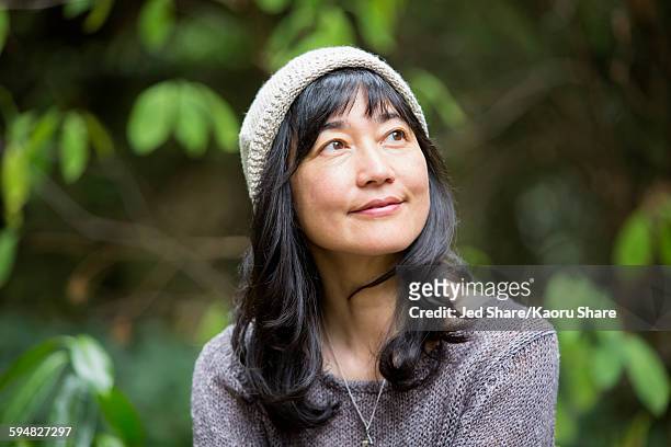 japanese woman in garden - disruptagingcollection fotografías e imágenes de stock