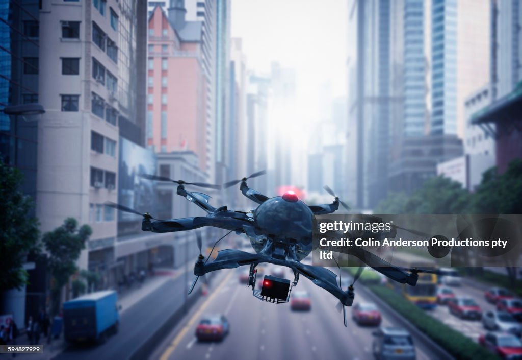 Drone flying over Hong Kong cityscape, Hong Kong