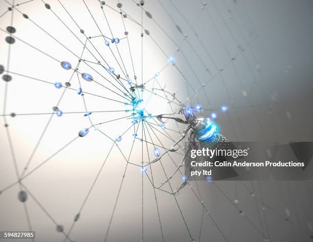 robotic spider climbing spider web - digital enhancement stock pictures, royalty-free photos & images