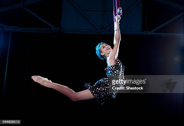 mixed race acrobat performing - artista del circo foto e immagini stock