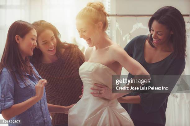 bride and friends shopping for wedding gown - brudklänning bildbanksfoton och bilder