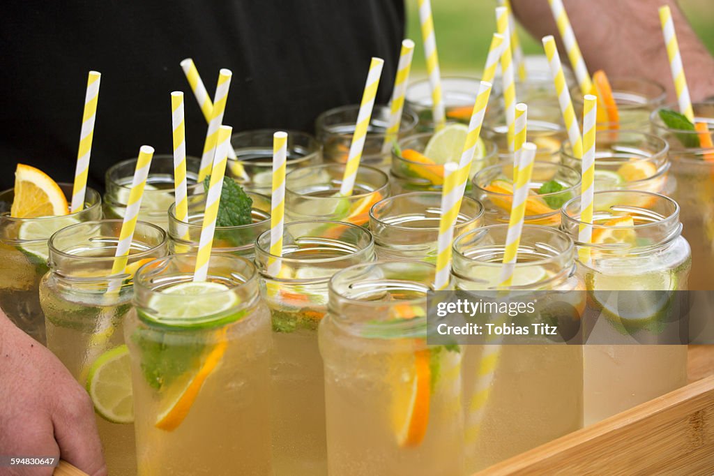 Lemonade in mason jars with drinking straws