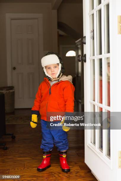 caucasian boy wearing snow gear - child winter coat stock pictures, royalty-free photos & images