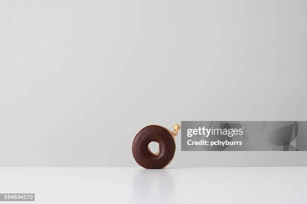 conceptual donut made from a balloon - chocolate shapes stock pictures, royalty-free photos & images