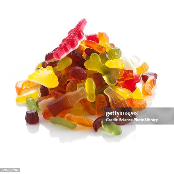 sweets - pile of candy stock pictures, royalty-free photos & images