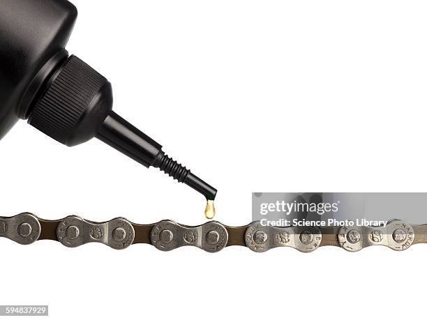 lubricant oil and bicycle chain - lubricación fotografías e imágenes de stock