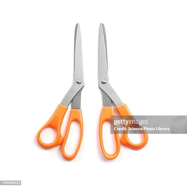 left and right handed scissors - scissor stock pictures, royalty-free photos & images