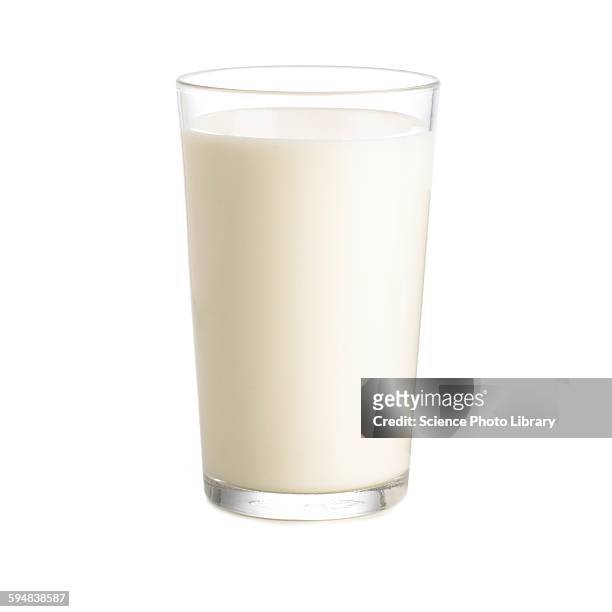 glass of milk - glass of prosecco stockfoto's en -beelden