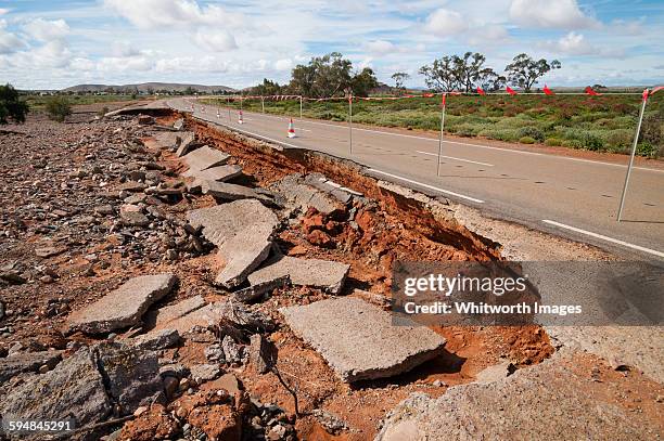 flood damage to road in outback south australia - leigh creek imagens e fotografias de stock