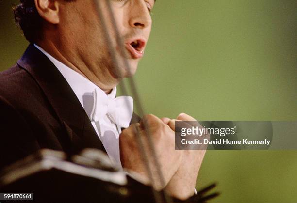 José Carreras performs at The Three Tenors concert at Dodger Stadium, July 16, 1994 in Los Angeles. The concert is programmed to coincide with the...