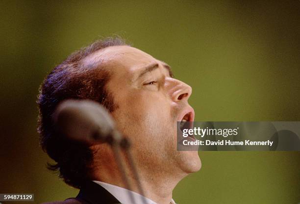 José Carreras performs at The Three Tenors concert at Dodger Stadium, July 16, 1994 in Los Angeles. The concert is programmed to coincide with the...