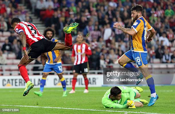 Patrick Van Aanholt of Sunderland has his shot saved by Shrewsbury keeper Jayson Leutwiler during the EFL Cup second round match between Sunderland...