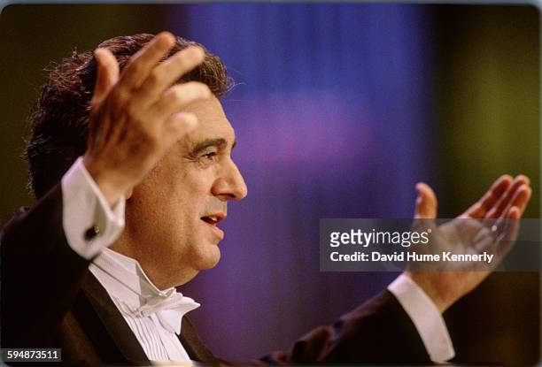 Plácido Domingo performs at The Three Tenors concert at Dodger Stadium, July 16, 1994 in Los Angeles. The concert is programmed to coincide with the...