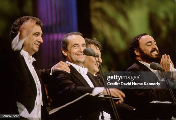 Plácido Domingo, José Carreras, conductor Zubin Mehta, and Luciano Pavarotti at the end of The Three Tenors concert at Dodger Stadium, July 16, 1994...