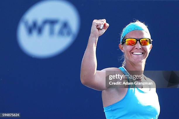 Kirsten Flipkens of Belgium reacts after her victory over Caroline Garcia on day 4 of the Connecticut Open at the Connecticut Tennis Center at Yale...