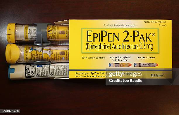 In this photo illustration, EpiPen, which dispenses epinephrine through an injection mechanism for people with severe allergies, is seen as the...