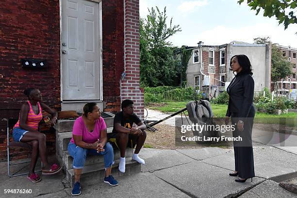 State's Attorney for Baltimore, Maryland, Marilyn J. Mosby walks through the Sandtown-Winchester neighborhood, where Freddie Gray was arrested, on...