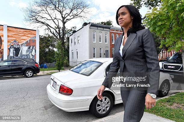 State's Attorney for Baltimore, Maryland, Marilyn J. Mosby walks through the Sandtown-Winchester neighborhood, where Freddie Gray was arrested, on...