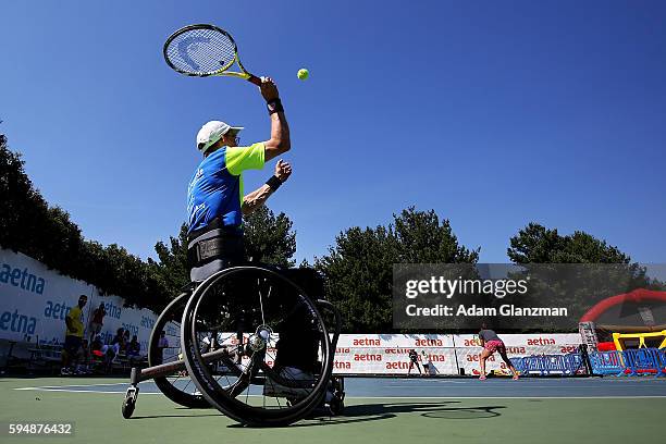 Abigail Spears and Raquel Kops-Jones participate in a wheelchair tennis clinic on day 4 of the Connecticut Open at the Connecticut Tennis Center at...