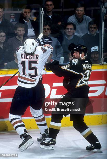 Grant Marshall of the Dallas Stars checks Chad Kilger of the Edmonton Oilers during Game 3 of the 2000 Conference Quarter-Finals on April 16, 2000 at...