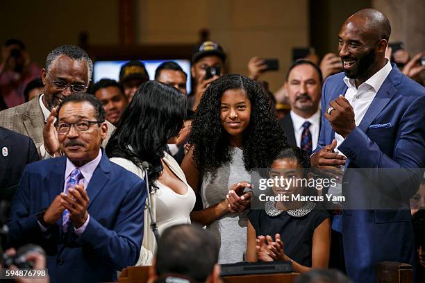 Kobe Bryant, far right, and his family, his wife Vanessa Laine Bryant, left, and daughters Gianna Maria Onore Bryant, center, and Natalia Diamante...