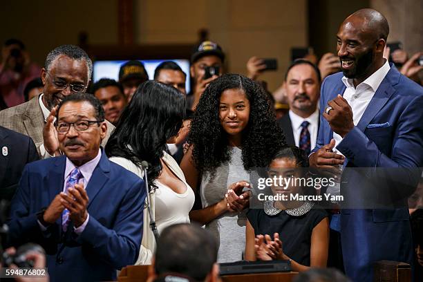 Kobe Bryant, far right, and his family, his wife Vanessa Laine Bryant, left, and daughters Gianna Maria Onore Bryant, center, and Natalia Diamante...