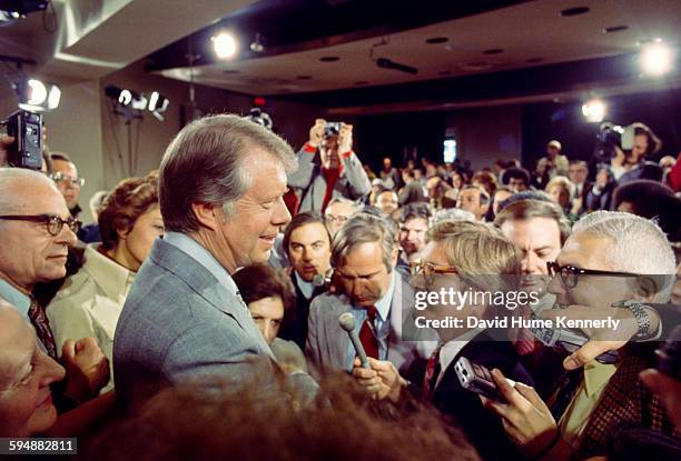 President Jimmy Carter answers questions from the press after holding a presidential news conference at the Old Executive Office Building, April 15,...