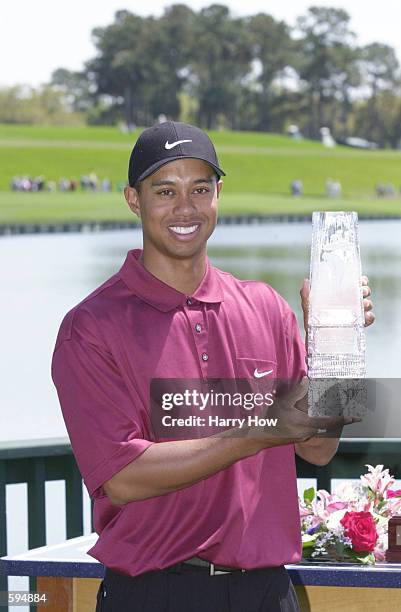 Tiger Woods poses with the 2001 Players Championship trophy at TPC at Sawgrass in Ponte Vedra Beach, Florida. DIGITAL IMAGE. Mandatory Credit: Harry...