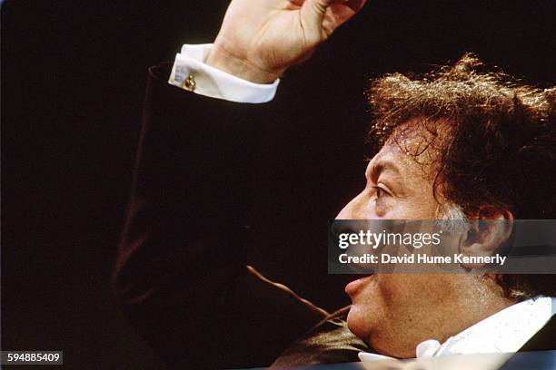 Zubin Mehta conducting the Los Angeles Philharmonic at The Three Tenors concert at Dodger Stadium, July 16, 1994 in Los Angeles. The concert is...