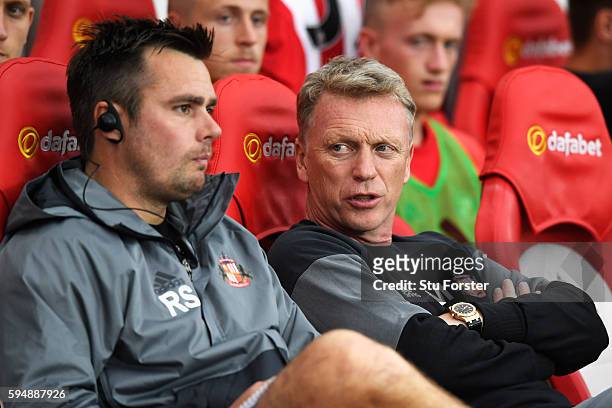 David Moyes, Manager of Sunderland talks to coach Robbie Stockdale during the EFL Cup second round match between Sunderland and Shrewsbury Town at...